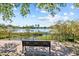 Scenic view of lake and city skyline from bench at 1115 Crescent Lake N Dr, St Petersburg, FL 33701