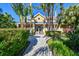 Community clubhouse features manicured landscaping at 115 112Th Ne Ave # 1027, St Petersburg, FL 33716