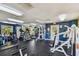 Brightly lit gym offers a variety of cardio machines and weight-training equipment at 115 112Th Ne Ave # 1027, St Petersburg, FL 33716