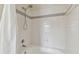 Shower with white tiling and a shower head at 115 112Th Ne Ave # 1027, St Petersburg, FL 33716