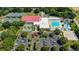 Expansive community recreation center with pools, tennis courts, playgrounds, and ample parking at 11510 Moffat Pl, Temple Terrace, FL 33617