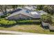 Charming single story brick home with mature landscaping and well-maintained lawn at 11510 Moffat Pl, Temple Terrace, FL 33617
