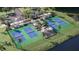 Overhead view of the community's well-maintained pickleball courts and surrounding amenities at 11864 Blue Diamond Trl, Parrish, FL 34219