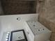 Bathroom featuring a modern white vanity and walk-in tiled shower at 1204 23Rd W Ave, Palmetto, FL 34221