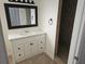 Bathroom featuring a modern white vanity and walk-in tiled shower at 1204 23Rd W Ave, Palmetto, FL 34221