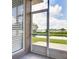 Balcony features lake views, offering serene outdoor living at 12170 Lake Allen Dr, Largo, FL 33773