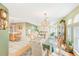 Dining room boasts natural light with a view of living space at 12501 Ulmerton Rd # 14, Largo, FL 33774