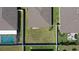 Aerial view showcasing a fenced-in backyard, adjacent properties, and nearby community features at 12618 Sandpine Reserve Pl, Gibsonton, FL 33534