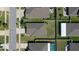 Aerial view of a fenced backyard adjacent to neighboring properties in a suburban neighborhood at 12618 Sandpine Reserve Pl, Gibsonton, FL 33534