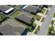 This is an aerial view shows backyard, mature trees and convenient access to the nearby street at 12618 Sandpine Reserve Pl, Gibsonton, FL 33534