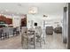 Open floor plan featuring dining area adjacent to kitchen and living room at 12618 Sandpine Reserve Pl, Gibsonton, FL 33534