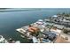 Waterfront home with private dock, scenic water views, lush landscaping, and convenient access to the open waters at 13514 Garris Dr, Hudson, FL 34667