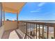Covered balcony offers tranquil waterfront views and fresh air at 13514 Garris Dr, Hudson, FL 34667