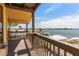 Relax and enjoy the waterfront views from the comfort of your private covered wooden balcony at 13514 Garris Dr, Hudson, FL 34667