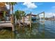 Enjoy your own private boat lift and dock with direct access to the intercoastal waterway at 13514 Garris Dr, Hudson, FL 34667