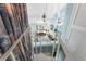 View from the upper level overlooking open living space and scenic surroundings at 13514 Garris Dr, Hudson, FL 34667