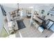Bright open floor plan featuring kitchen, dining and living area, all with scenic views at 13514 Garris Dr, Hudson, FL 34667