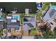 An aerial view of a private home shows the solar panels and backyard dock at 1361 46Th Ne Ave, St Petersburg, FL 33703