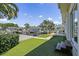 Beautiful backyard featuring artificial turf and waterfront views with dock access at 1361 46Th Ne Ave, St Petersburg, FL 33703