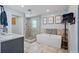 Modern bathroom featuring a glass enclosed shower, soaking tub, and stylish tile work at 1361 46Th Ne Ave, St Petersburg, FL 33703