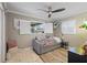Charming bedroom with decorative window shutters and wood-look floors offers comfort and style at 1361 46Th Ne Ave, St Petersburg, FL 33703