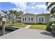 Beautiful home exterior with manicured lawn and easy access to the waterway and dock at 1361 46Th Ne Ave, St Petersburg, FL 33703