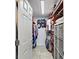 Well-organized walk-in closet features ample storage space with shelving and drawers at 1361 46Th Ne Ave, St Petersburg, FL 33703