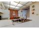 Kitchen with appliances, a breakfast nook, and bright lighting at 14130 Rosemary Ln # 3312, Largo, FL 33774