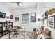 Comfortable office with a cozy couch, bookshelves, and decor that creates an inspiring workspace at 15723 Starling Water Dr, Lithia, FL 33547