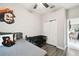 Bright bedroom features neutral walls, closet, and a modern ceiling fan at 16822 Balance Cv, Land O Lakes, FL 34638