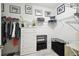 Organized walk-in closet with custom shelving and ample storage space at 16822 Balance Cv, Land O Lakes, FL 34638