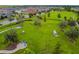 Overhead perspective of the dog park, with designated areas for play and lounging at 16822 Balance Cv, Land O Lakes, FL 34638