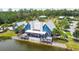 Beautiful clubhouse with a lakeside view and deck, offering a great space for community events and relaxation at 16822 Balance Cv, Land O Lakes, FL 34638
