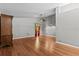 Spacious bedroom featuring hardwood floors, neutral paint colors, and a modern ceiling fan at 1700 Hunter Ln, Tarpon Springs, FL 34689