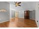 Inviting living room with hardwood floors, neutral paint colors, and cozy ambiance at 1700 Hunter Ln, Tarpon Springs, FL 34689