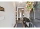 Elegant entryway with wood floors, complemented by decorative accents and a welcoming atmosphere at 19370 Hawk Valley Dr, Tampa, FL 33647