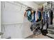 Spacious walk-in closet with ample shelving and storage solutions for organized living at 19370 Hawk Valley Dr, Tampa, FL 33647