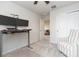 Functional home office with a standing desk, comfortable seating, and neutral tones at 20925 Monza Loop, Land O Lakes, FL 34638