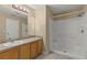 Bright bathroom featuring a tub-shower combo and a single-sink vanity at 2441 Hibiscus Bay Ln, Brandon, FL 33511