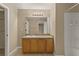 Bathroom featuring wood cabinets, tile flooring and a shower/tub combination at 2441 Hibiscus Bay Ln, Brandon, FL 33511