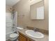 Neutral bathroom featuring a tub-shower combo, sink and mirror at 2441 Hibiscus Bay Ln, Brandon, FL 33511