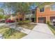 Charming colorful townhomes with private garages and beautiful landscaping at 2441 Hibiscus Bay Ln, Brandon, FL 33511
