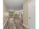 Spacious living room features hardwood floors and natural lighting at 2441 Hibiscus Bay Ln, Brandon, FL 33511