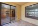 An outdoor patio with a sliding glass door view of the kitchen at 2441 Hibiscus Bay Ln, Brandon, FL 33511