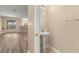 Cozy powder room features a pedestal sink and neutral walls at 2441 Hibiscus Bay Ln, Brandon, FL 33511