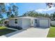 Charming single-story home featuring a well-maintained front yard and a convenient attached garage at 2712 60Th N Ave, St Petersburg, FL 33714