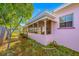 Charming covered porch with screened window details offering nice natural light at 2827 1St Ne St, St Petersburg, FL 33704