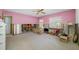Spacious living room with partial walls and window for lots of natural light at 2827 1St Ne St, St Petersburg, FL 33704