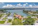 Beautiful waterfront home with private dock and lush landscaping, perfect for enjoying waterfront living and outdoor activities at 362 41St Ave, St Pete Beach, FL 33706
