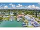 Gorgeous waterfront homes with boat docks, lush landscaping, and sparkling pools, ideal for relaxing and outdoor activities at 362 41St Ave, St Pete Beach, FL 33706